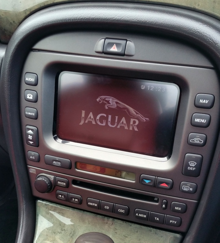 AC upgraded to Climate Control, and touchscreen and navigation system installed.